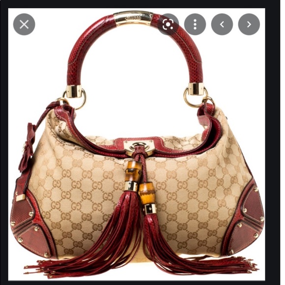 Gucci Handbags - EUC Gucci Indy Bag